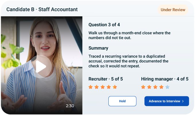 Recruiter reviewing a candidate's recorded video answers on a shared scorecard